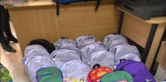 FOTO Donație de rechizite, ghiozdane și măști de protecție pentru elevii Școlii Pufești