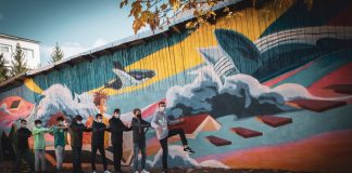 FOTO Pereții și gardul Școlii ”Principele Radu” Adjud sunt mai ”prietenoase”. Au fost pictate de artiștii de ZidArt Bacău