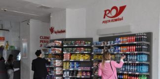 În oficiile poștale se vor vinde produse de la Auchan