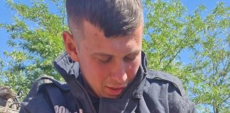 Pisică norocoasă: a fost salvată de un pompier după ce căzuse într-o fântână