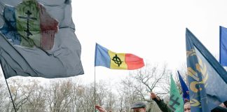 Control judiciar pentru 7 inculpați care promovează simboluri fasciste, legionare și xenofobe