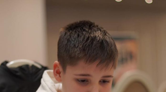 Medalie națională de bronz pentru micul șahist focșănean Darius Pană